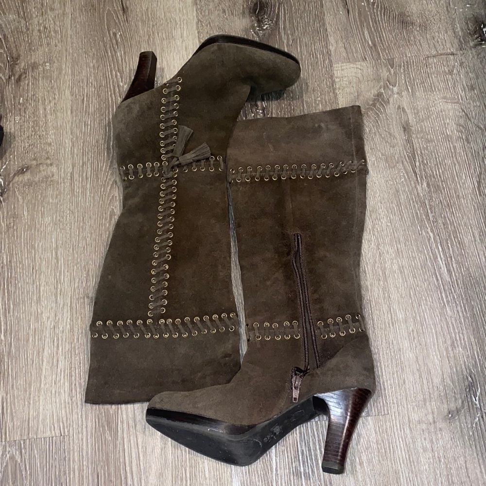 Knee high heeled boots by Madeline